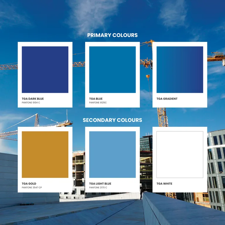 TGA color palette of blue, gold and white Pantone swatches over a construction site photograph