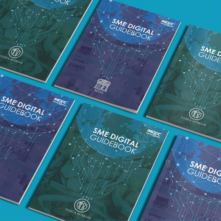 MDEC digital guidebook spread with transformation roadmap infographic